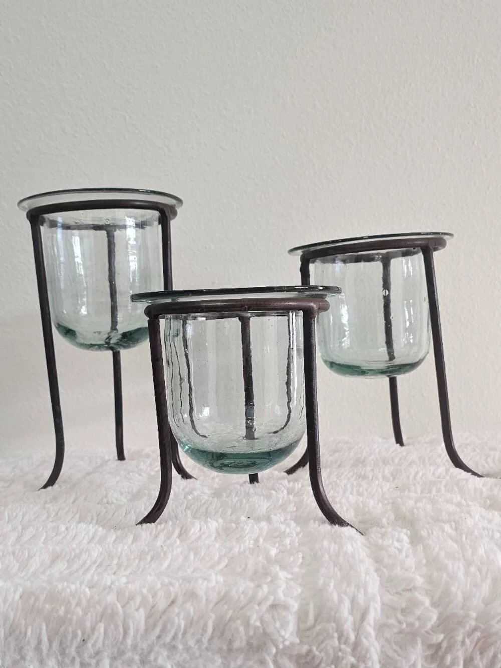 Wrought iron and hand-blown glass candle holders